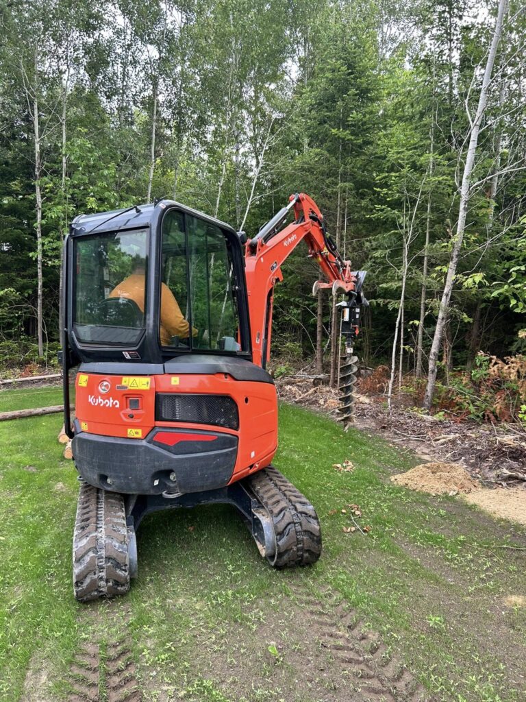rent a post hole auger attachment on manitoulin island for excavator